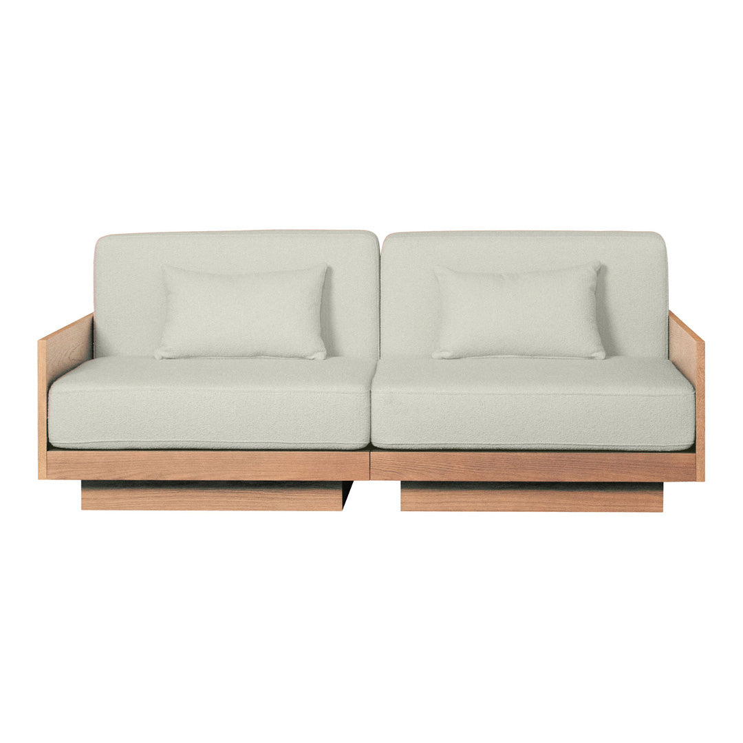 Light gray cushions with a smooth texture on a natural wood frame, creating a modern, minimalist design.