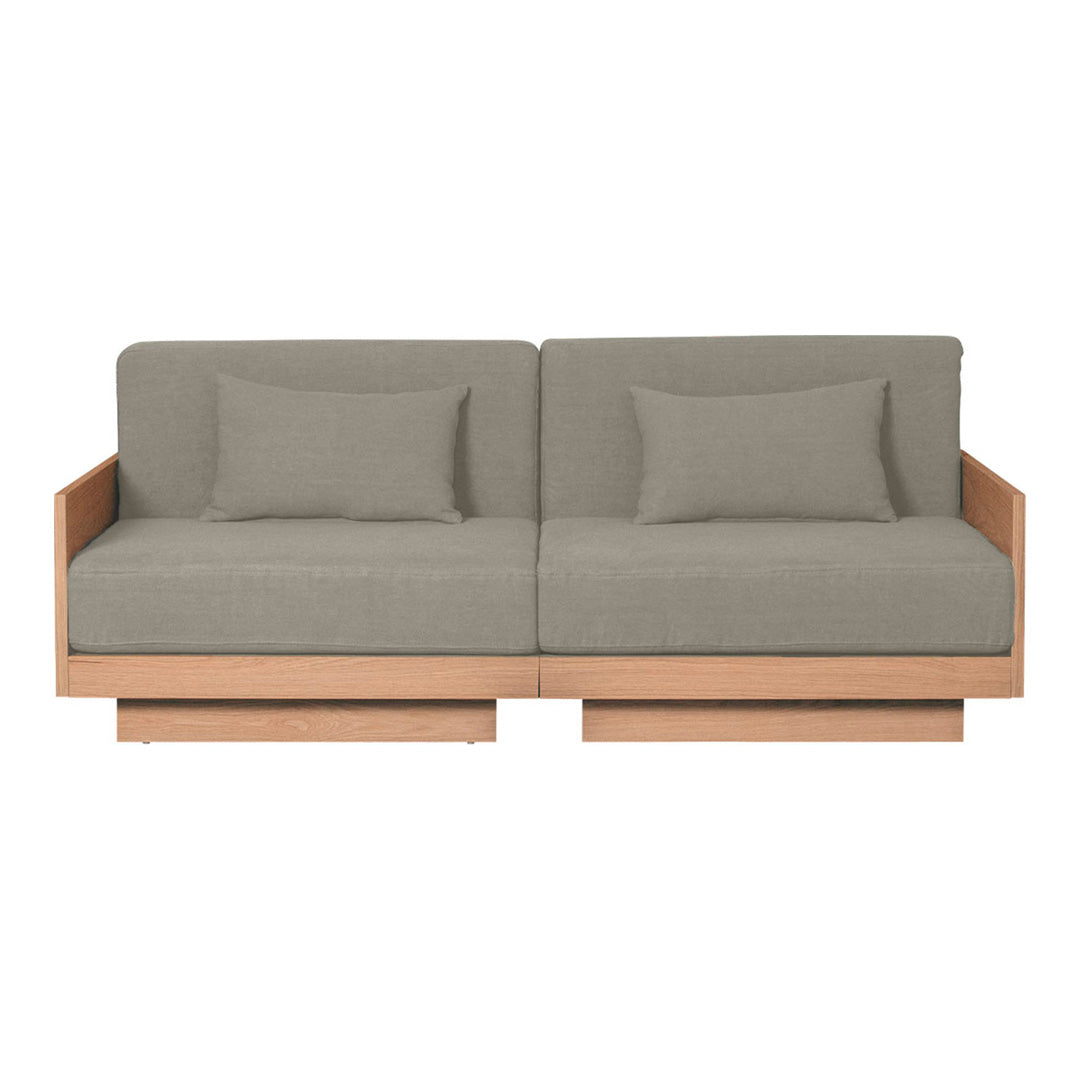 Modern gray sofa with subtle texture, complemented by light wood frame and matching cushions. Elegant and minimalist design.