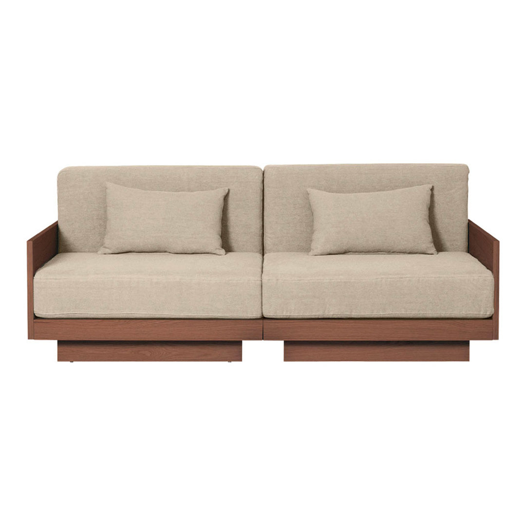 Beige upholstered sofa with light brown wooden frame and two matching cushions, featuring a minimalist design.