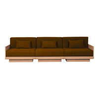 Brown velvet sofa with a minimalist wooden base and three matching cushions, featuring solid color and subtle textures.