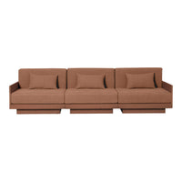 Three-seat sofa in warm brown fabric with subtle texture and matching pillows. Modern, minimalist design.