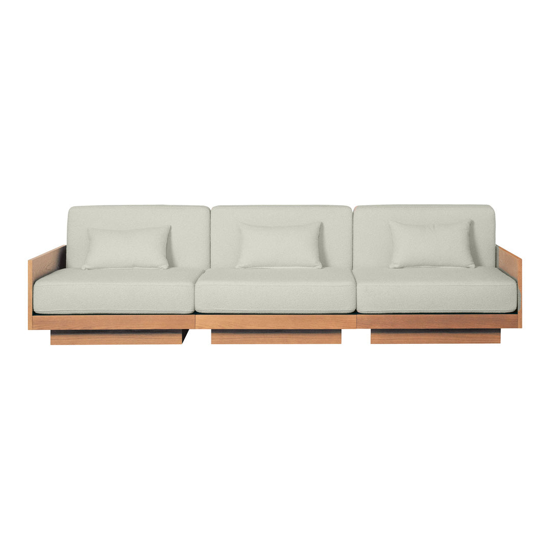 Modern three-seat sofa in soft gray upholstery with clean lines and natural wood accents. Ideal for contemporary spaces.