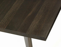 Dark brown wood table surface featuring a sleek, striped pattern with a smooth finish.