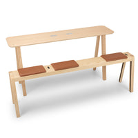 Natural wood finish with smooth surfaces and leather accents in warm brown tones. Minimalist design with clean lines.