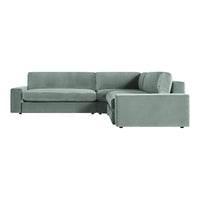 Soft, muted green velvet sectional sofa with sleek, modern design and smooth, solid upholstery. Ideal for contemporary decor.