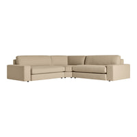 Beige L-shaped sofa with smooth upholstery, featuring clean lines and a modern, minimalist design.