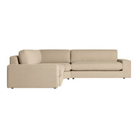 Beige sectional sofa with a modern, minimalist design and smooth fabric upholstery. Ideal for contemporary living rooms.