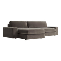Gray sectional sofa with a sleek, modern design and soft, textured upholstery. Perfect for contemporary living spaces.