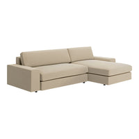 Beige sectional sofa with a minimalist design and smooth, soft fabric upholstery. Perfect for modern living spaces.