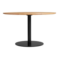 Round wooden table with a light oak top and sleek black pedestal base. Modern, minimalist design.