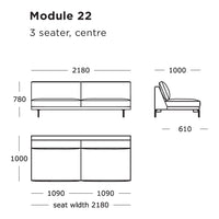 "Minimalist three-seater sofa design, featuring a sleek, neutral color palette and clean, modern lines."