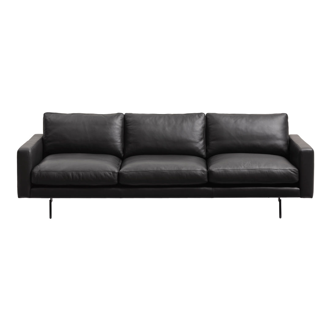 Sleek black leather sofa with smooth cushions and minimalist design, featuring a modern, clean aesthetic.