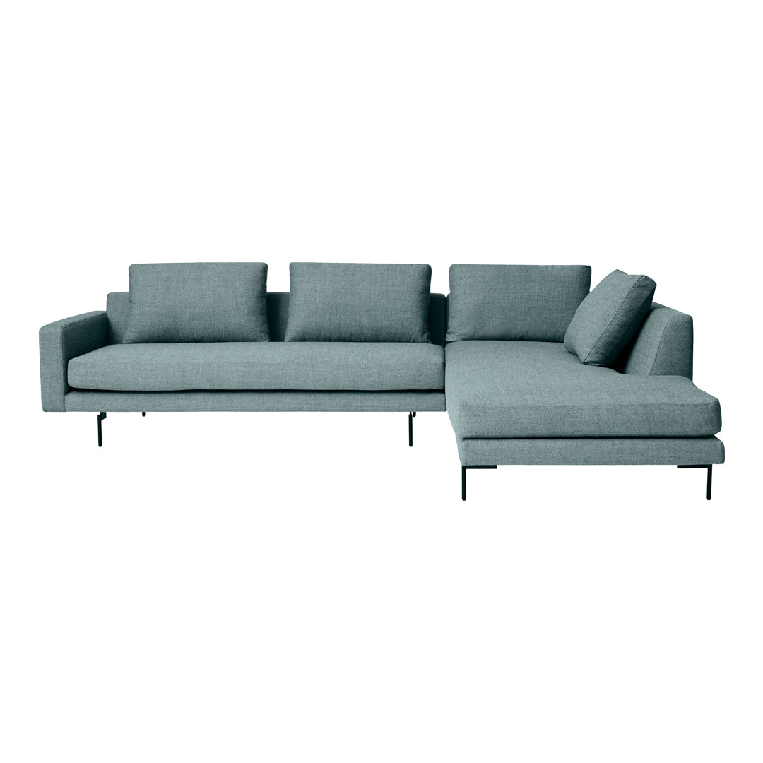 Teal modern sectional sofa with a clean design, featuring solid color and minimalist style, perfect for contemporary decor.