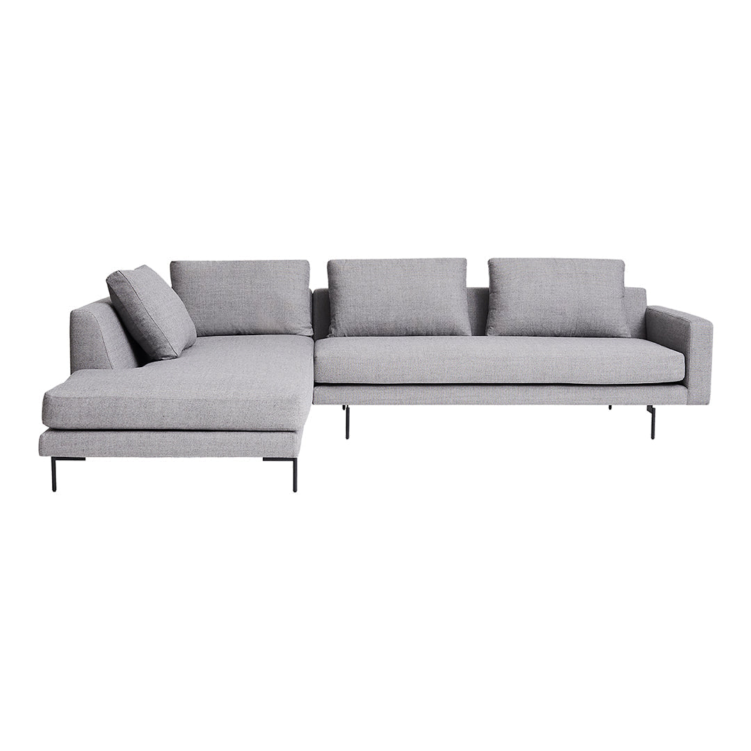Modern gray sectional sofa with a sleek design and subtle texture, featuring plush cushions and minimalist metal legs.