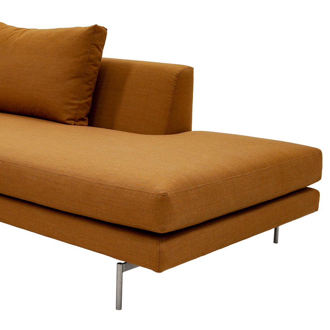 "Rust-orange modern sofa with a sleek design and soft fabric upholstery, featuring a matching plush cushion."