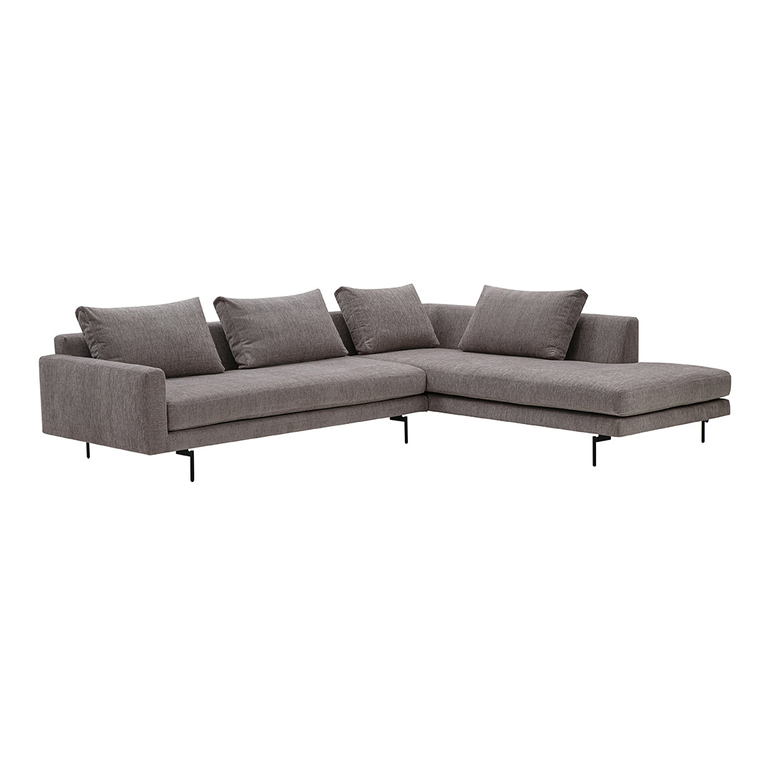 Gray sectional sofa with soft upholstery and sleek metal legs, featuring a minimalist design and subtle texture.