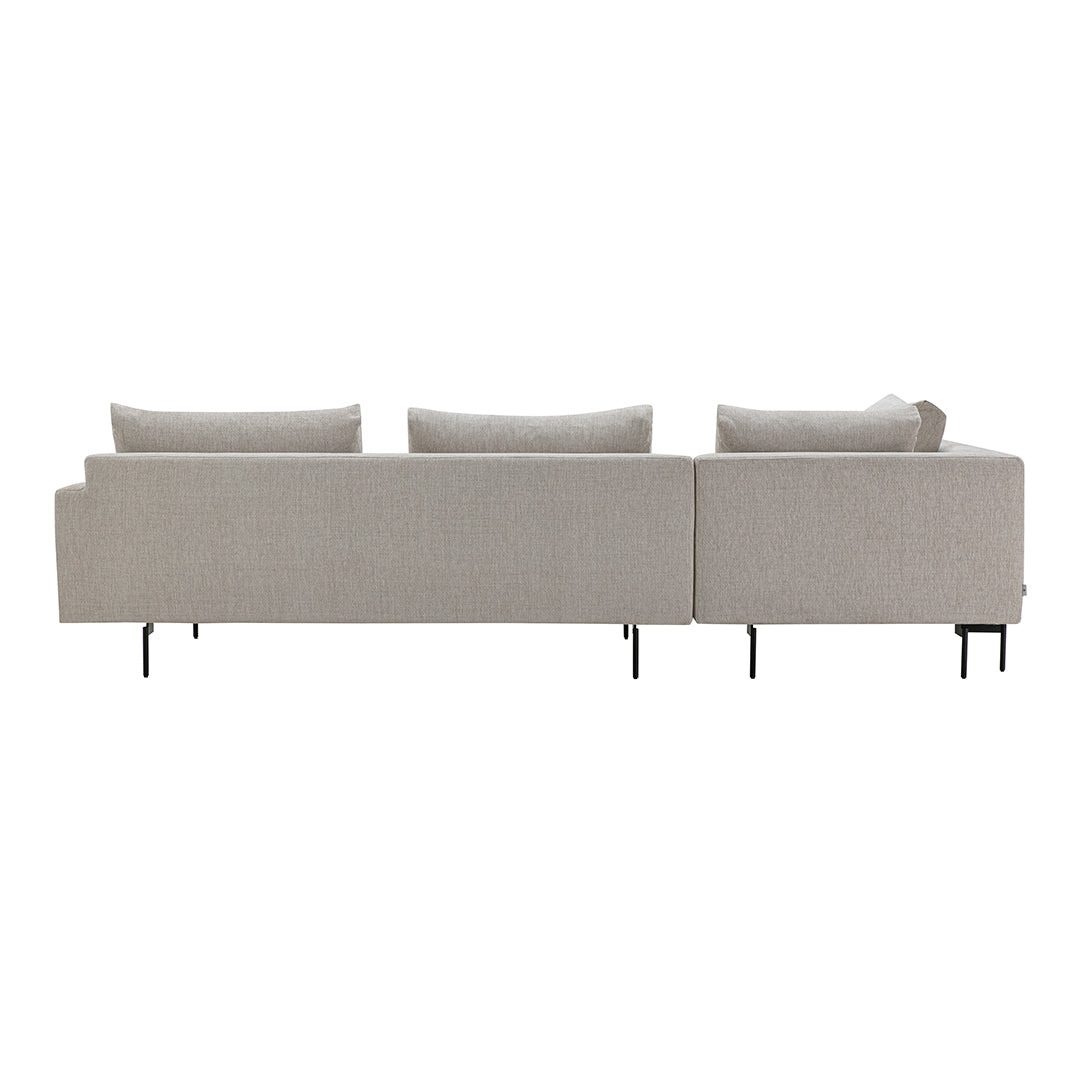 Light beige sofa with minimalist design, featuring plush cushions and sleek black metal legs.