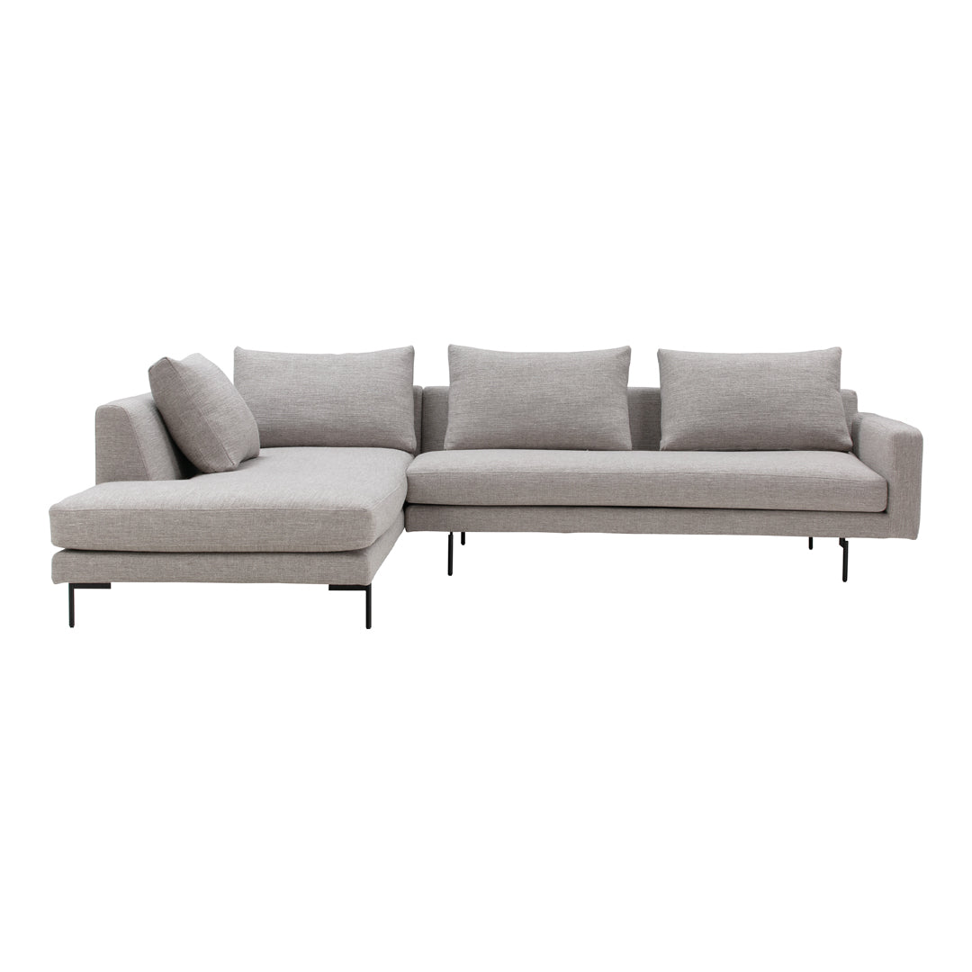 Gray sectional sofa with smooth upholstery and minimalist design, featuring matching cushions. Modern and stylish.