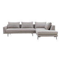 Gray sectional sofa with clean lines and plush cushions, featuring a minimalist design and sleek metal legs.