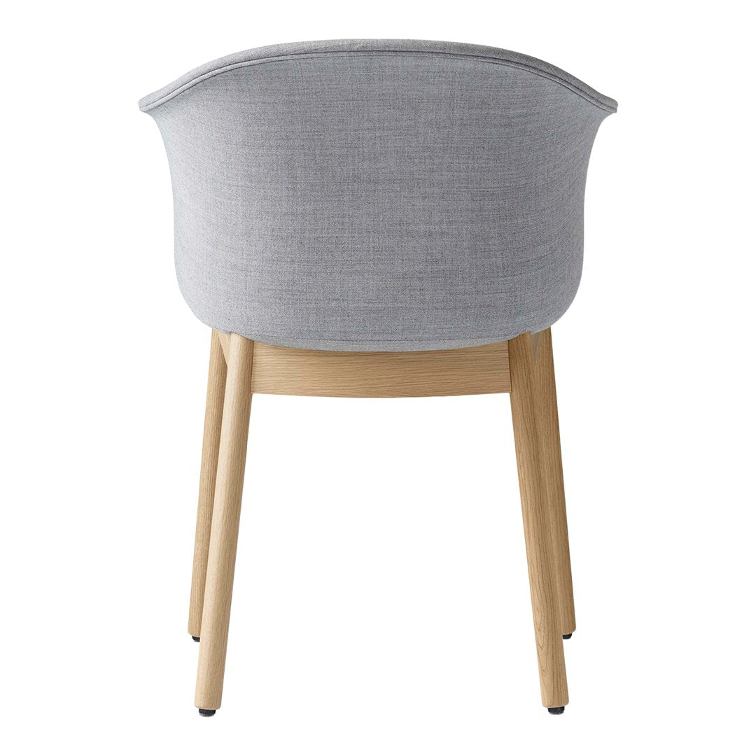 Gray upholstered chair with a smooth texture and light wood legs, showcasing a minimalist, modern design.