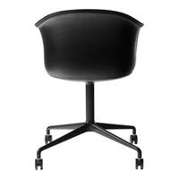Black padded office chair with a sleek curved back and minimalist black base on rolling wheels.