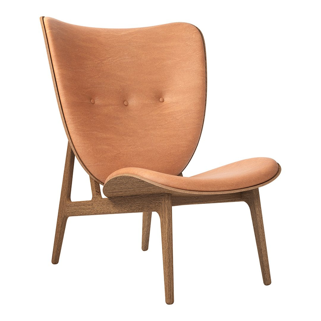 Tan leather armchair with smooth surface and subtle button tufting, featuring a natural wood base. Elegant and modern design.