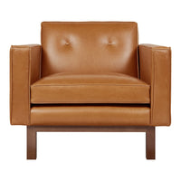 Tan leather armchair with smooth texture and two button accents, featuring a modern wooden base.