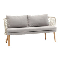 Gray fabric sofa with woven rattan back and light wooden legs, perfect for modern decor.