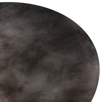 Round rug featuring a muted gradient of dark gray to black with a subtle textured pattern. Perfect for sophisticated decor.