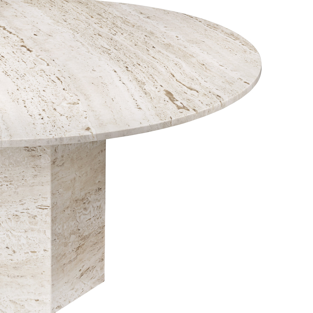 Neutral beige round table with subtle textured patterns, featuring a smooth finish and minimalist design.