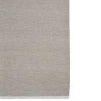 Tan textured fabric with a subtle woven pattern; perfect for various home decor styles.