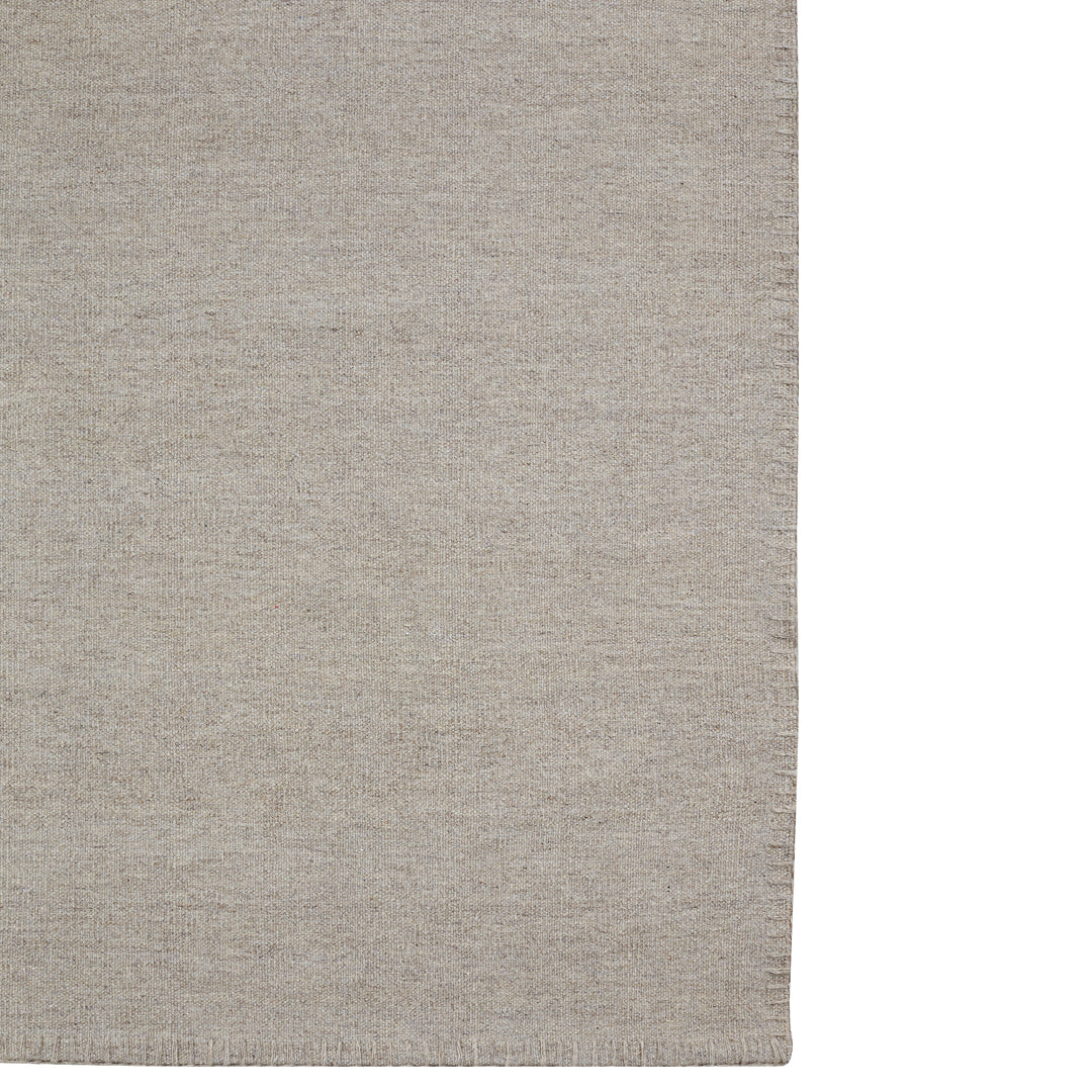 Light beige woven fabric with a subtle texture, perfect for adding warmth to any space.