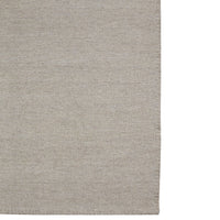Light beige woven fabric with a subtle texture, perfect for adding warmth to any space.