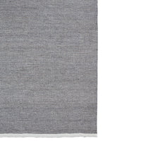 Textured gray fabric with a subtle woven pattern and a contrasting white edge. Ideal for stylish home decor.