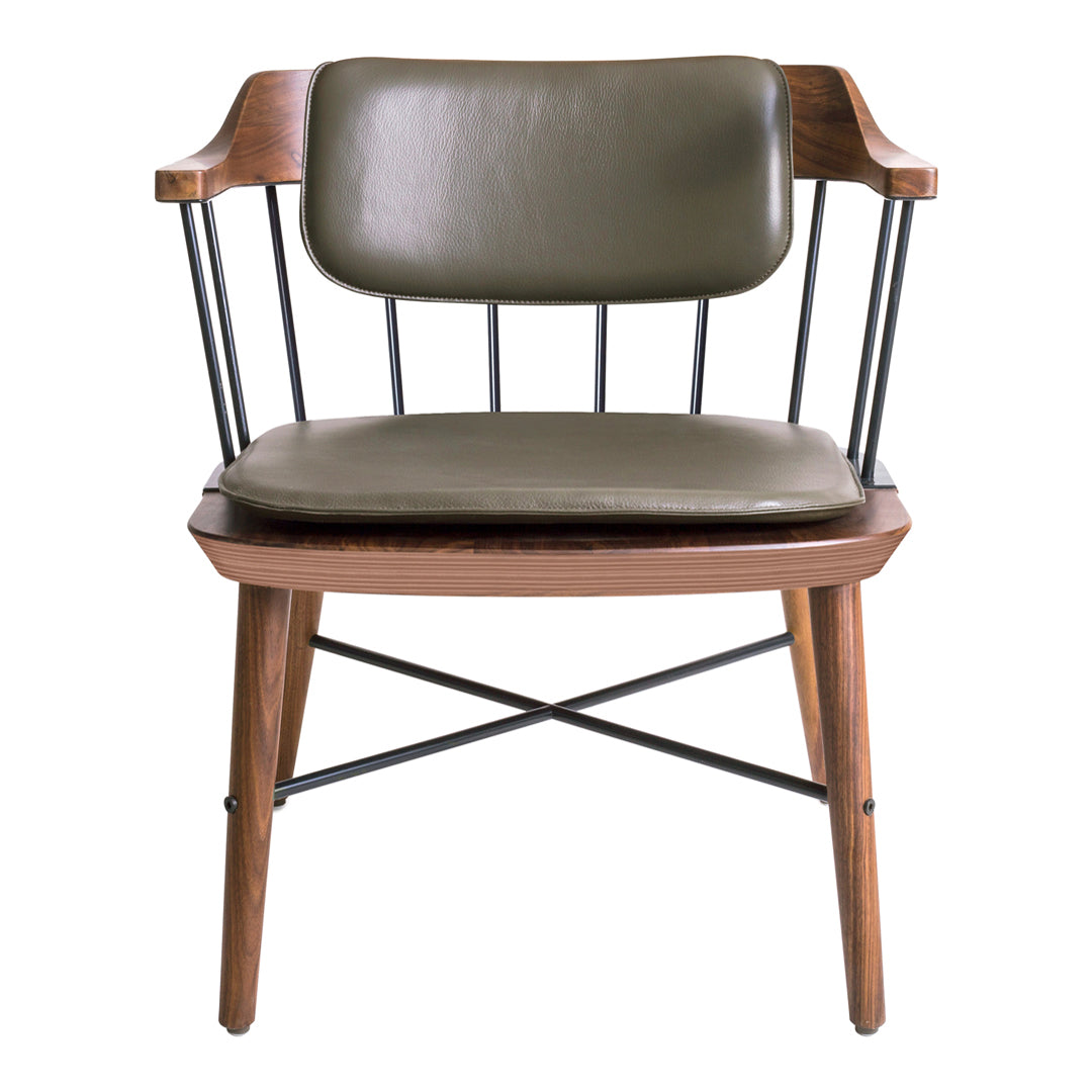 "Mid-century chair with olive green leather seat and back, wooden frame, and black metal accents."