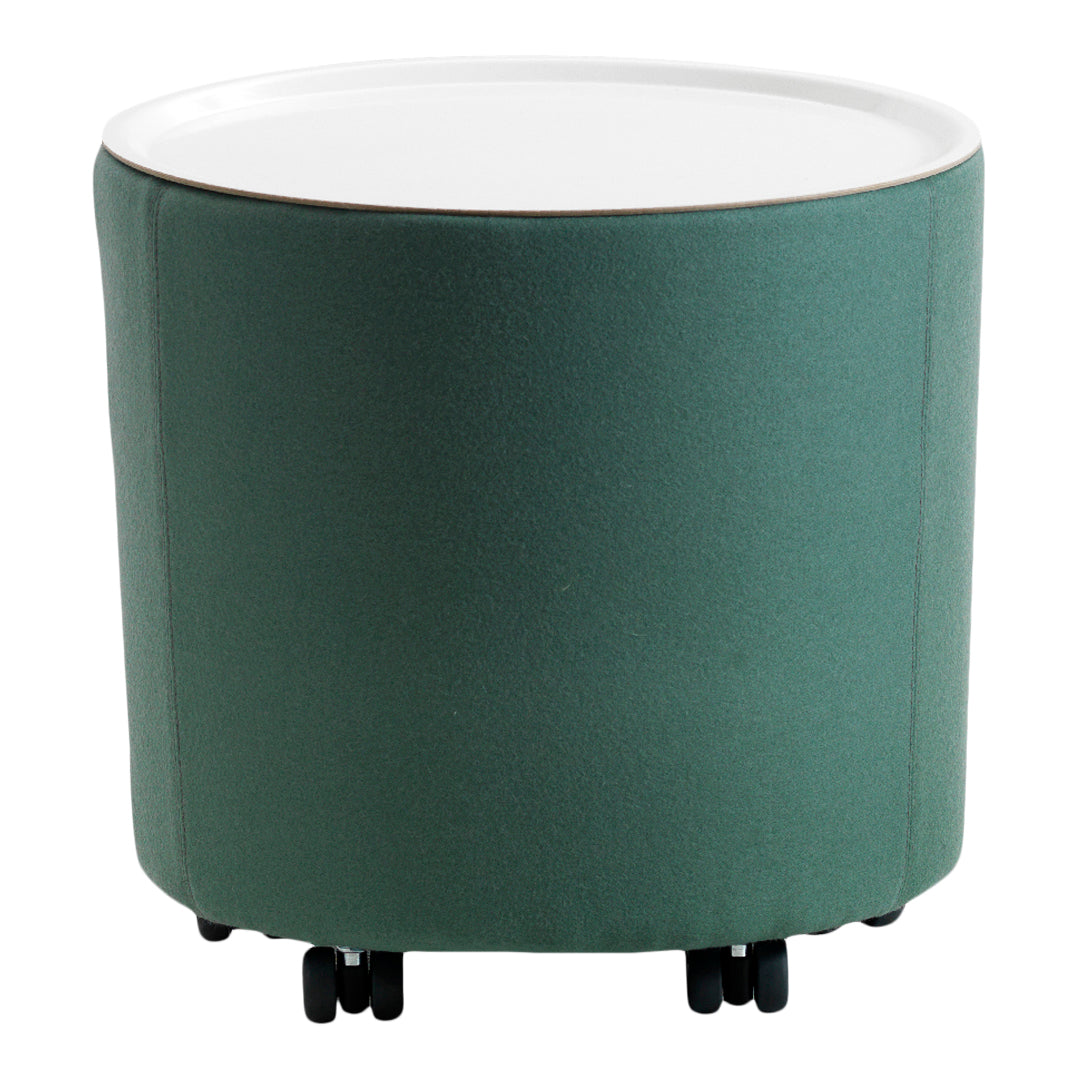 Green upholstered round ottoman with a smooth white top and black wheels for mobility.