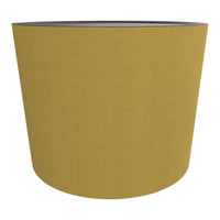 "Yellow textured planter with a matte finish and black interior for modern decor."