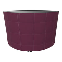 Round planter in deep burgundy with a smooth finish and subtle grid pattern for modern decor.