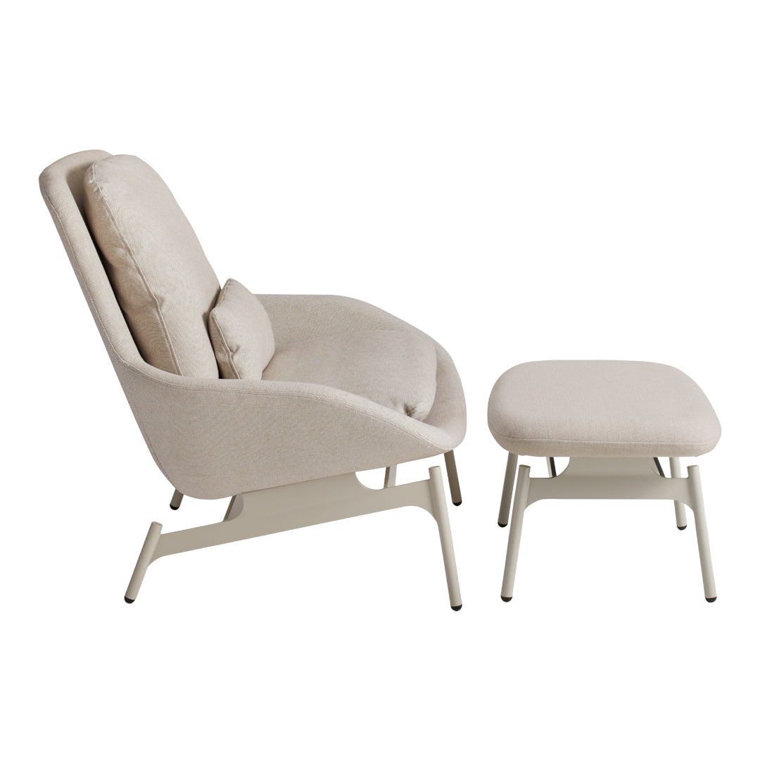 Light beige upholstered chair and ottoman set with a modern, minimalist design and soft, textured fabric.