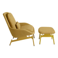 Yellow upholstered lounge chair with matching ottoman, featuring smooth, modern lines and a minimalist design.