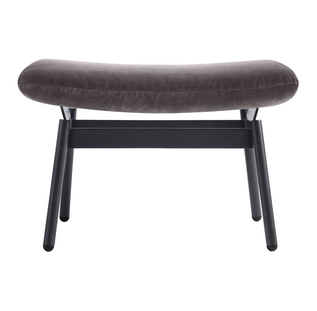 Gray upholstered bench with a smooth, curved design and black wooden legs, perfect for modern decor.