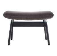 Gray upholstered bench with a smooth, curved design and black wooden legs, perfect for modern decor.