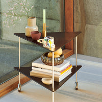 Triangular brown shelf with white accents, styled with colorful ceramics and natural textures. Modern and minimalist design.
