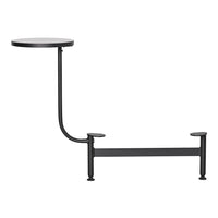 Black metal side table with a simple round top and curved leg design, showcasing a modern minimalist aesthetic.
