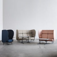 Modern upholstered sofas in navy, beige, and blush, featuring sleek lines and minimalist design. Perfect for contemporary spaces.
