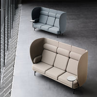 Two modern sofas in light beige and soft blue with sleek, curved lines and metallic accents on a textured gray floor.