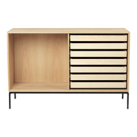 Modern minimalist storage cabinet with a natural wood finish and sleek black metal legs. Features smooth, light-colored drawers.