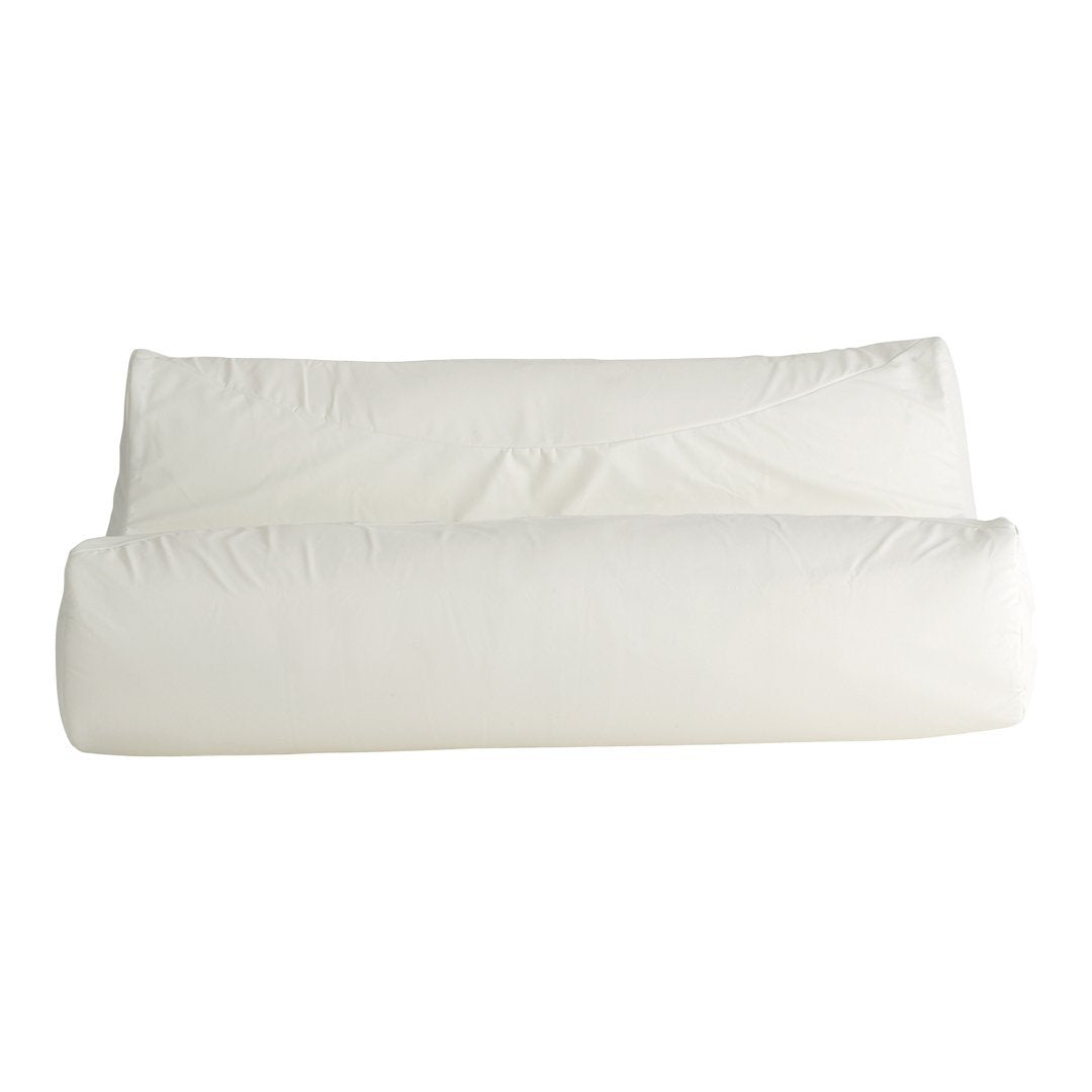 White elongated pillows with a smooth texture, perfect for sleek and modern decor.