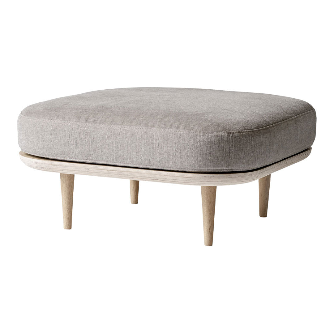 Gray square ottoman with a subtle fabric texture and natural wood legs, adding a modern touch to any space.