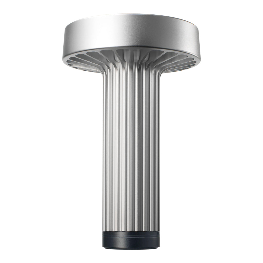 Sleek silver pedestal with ribbed texture and a matte black base, showcasing modern design and minimalistic elegance.